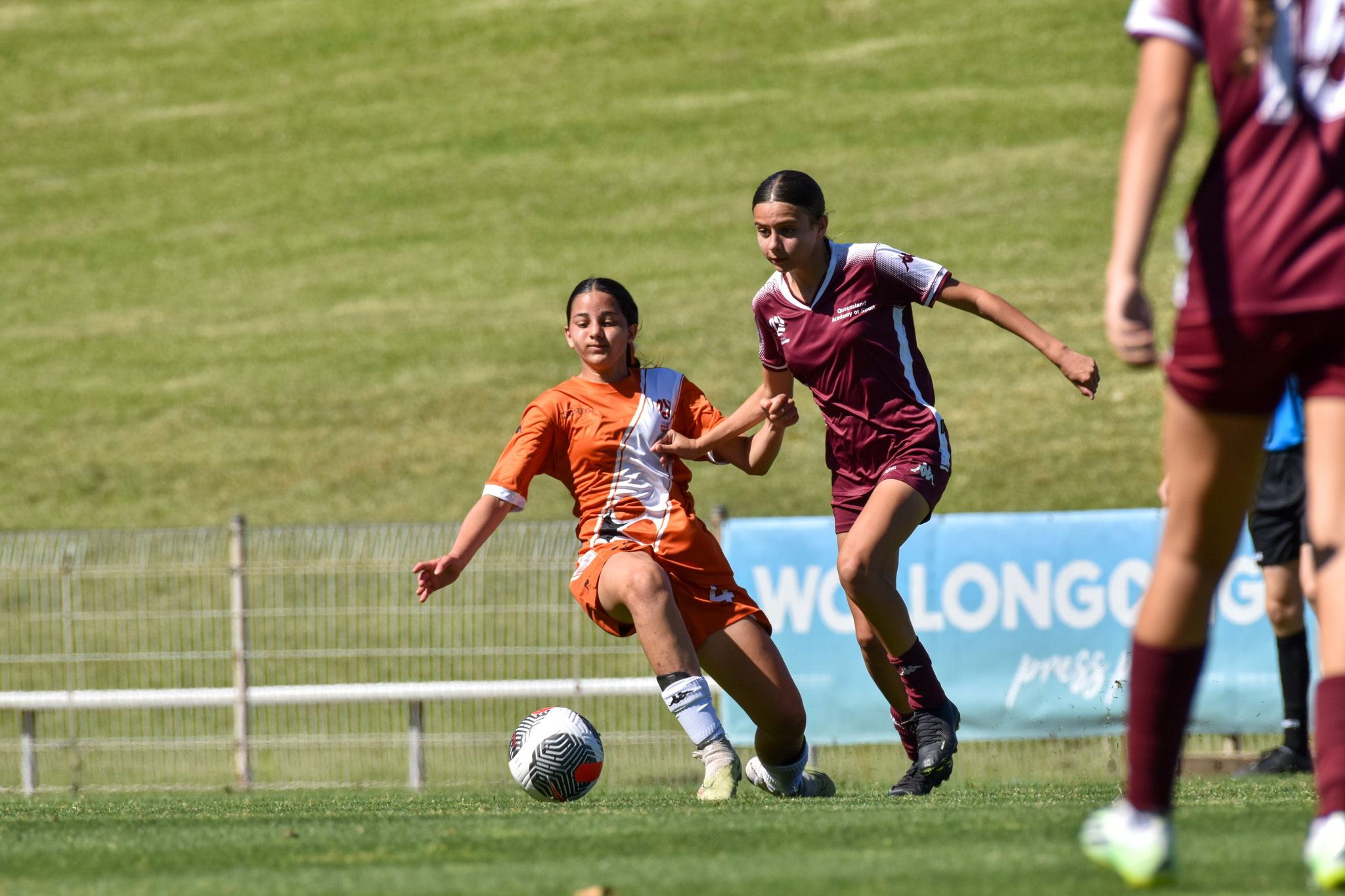 Queensland Silver taking on the Northern Territory in the Under 14 Pool B game during the National Youth Championships 2023 Girls' Tournament Day at WIN Stadium.